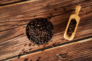 Whole black pepper | Dry peppercorn background, selective focus