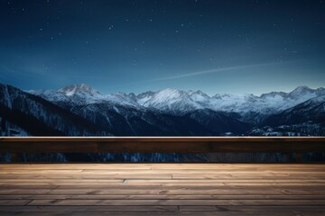 Empty wooden deck table with views of snowy mountains. With room for products