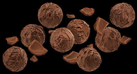 Chocolate balls isolated on black background