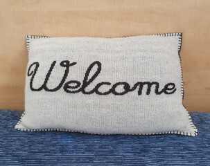 decorative pillow reading Welcome
