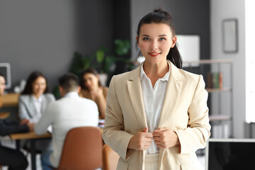 Portrait of businesswoman in conference hall
