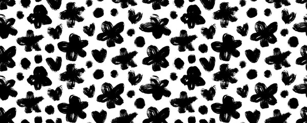 Seamless banner design with naive rustic black flowers, dots and hearts. Brush drawn bold flower silhouettes.