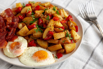 Homemade One-Pan Breakfast Potatoes on a Plate, side view.