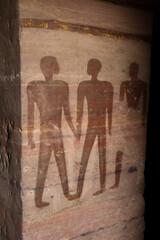 Ancient egyptian old kingdom carvings and hieroglyphs at the tombs of nobles in Aswan, Egypt 