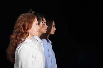 Beautiful young women on black background. Women history month