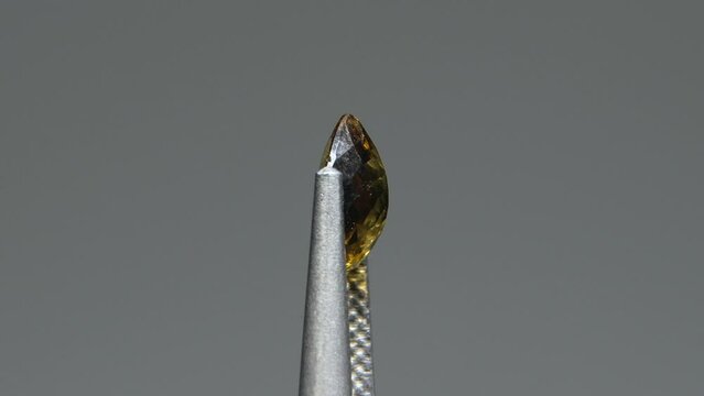 natural yellow grossular garnet on the white background