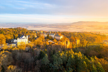 Hruba Skala chateau at cold morning sunrise time. Bohemian Paradise, Czech: Cesky raj, Czechia. Aerial view from above. - obrazy, fototapety, plakaty