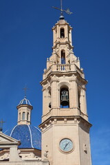 Fototapeta na wymiar Alcoy, Alicante, Spain, February 20, 2024: Bell Tower of the Parish of Santa Maria. Alcoy, Alicante, Spain
