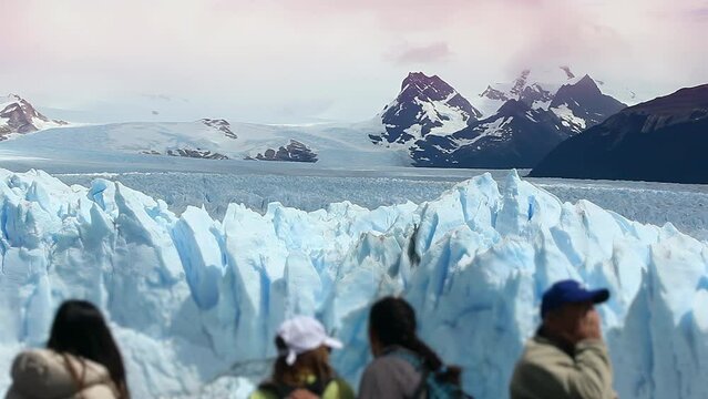 Blurred People in Front of the Perito Moreno Glacier, Los Glaciares National Park, Patagonia, Argentina, South America. 4K Resolution.
