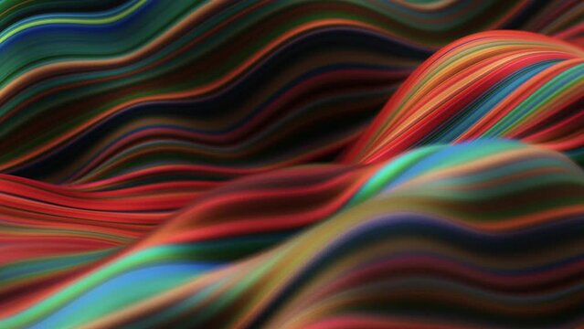 Abstract, fluid, wavy and colorful 3D lines seamless loop animation. Modern and contemporary feel in 4K. Metallic, iridescent and reflective with shades of orange, red, green, blue, yellow