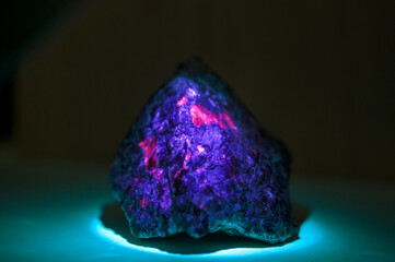 Yooperlite stone - fluorescent Sodalite stone shot in UV light
