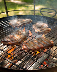 Steaks Cooking on Grill With Flames