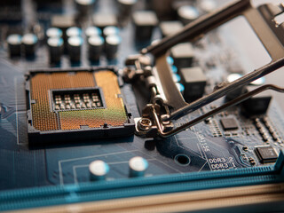 Maintenance Technician Inserting CPU on LGA1156 Motherboard