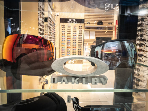 BELGRADE, SERBIA - FEBRUARY 12, 2024: Selective blur on an Oakley logo in front of their local retailer for belgrade. Oakley is an American manufacturer of sunglasses and sports equipment.