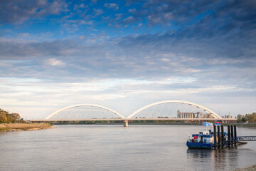 Panorama of the Danube river with the Zezeljev Most bridge in background at dusk. Zezelj bridge is...