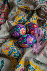 Colorful hand painted Easter eggs on retro fabric. The concept of Easter holidays, retro, handcraft, as it used to be.