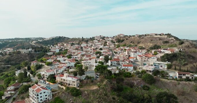 Aerial view Pissouri village Cyprus. The village is located on top of a mountain, a landscape of historical buildings, architecture and nature of the island.
