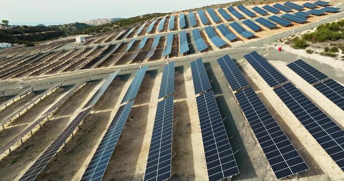 Aerial view of a solar power plant. Industrial landscape of solar panels, clean ecological electricity, nature protection. High quality 4k footage