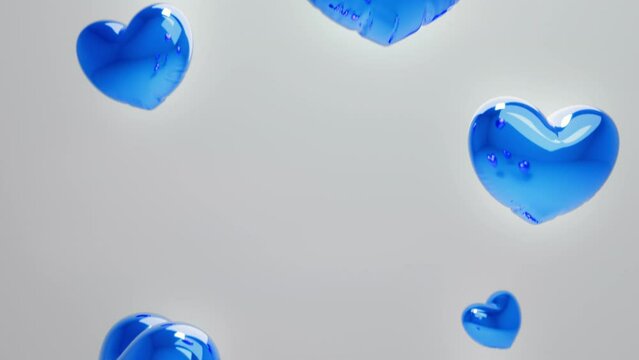 3d blue balloon hearts levitating in the white studio