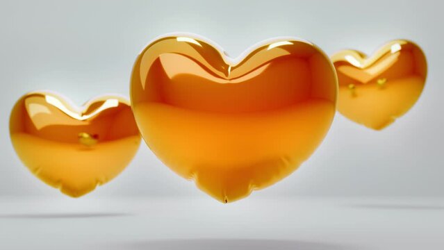 3d orange balloon hearts levitating in the white studio