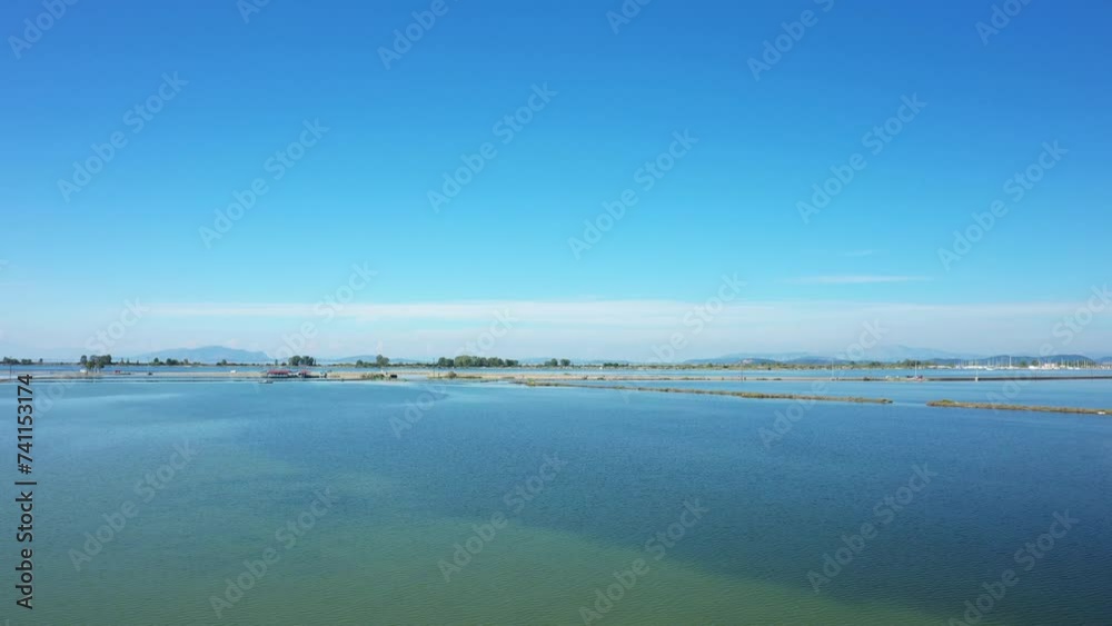 Sticker The salt marshes of Missolonghi facing the Mediterranean Sea in Europe, central Greece, in summer, on a sunny day.