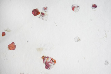Handmade paper with pressed rose petals and leaves.Textured paper with natural fiber layers.     - 741155399