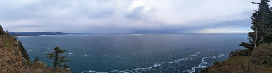Panoramic view of pacific ocean as seen from a cape lookout point. 