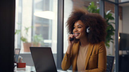 Smiling female customer service representative wearing a headset helps a customer in an office