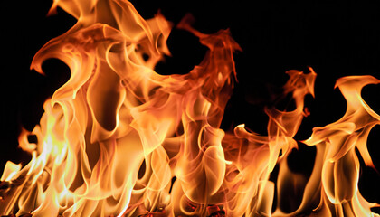 Fire flame in fireplace glowing burning on black dark background, hot for firefighter to safety, photo for creative graphic design wallpaper texture surface, beautiful flame light motion of bonfire