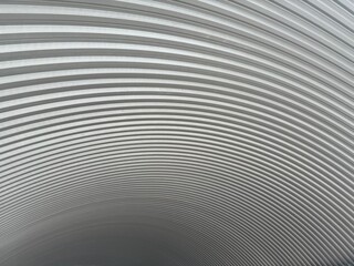 Large curved corrugated iron dome roof See a curve leading the eye as a pattern.