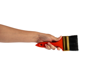 Clean new paint brush in hand isolated on transparent background.