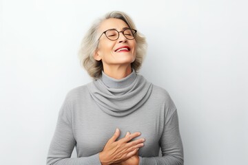 Smiling elderly woman, close-up of smiling elderly woman with white hair, healthy senior living