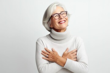 Smiling elderly woman, close-up of smiling elderly woman with white hair, healthy senior living