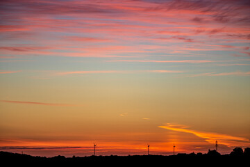 Naklejka premium Colorful sunrise with beautiful veil clouds