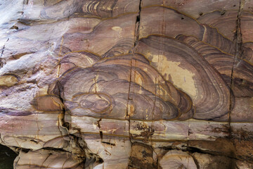 Indescribable  bizarre patterns on the walls of the rocks on the Mujib River along the tourist...