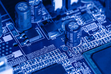 electronic components and microchips on computer circuit board. extreme closeup.