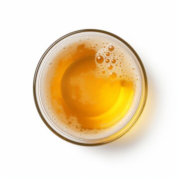 Top view of a glass of beer isolated on white background