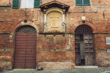 Fototapeta na wymiar Wall art of the Siena, Italy