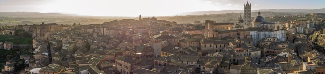 Fototapeta na wymiar Cityscape of Siena seen from Torre del Mangia, Tuscany, Italy