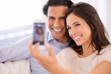 Happy couple, relax and selfie on sofa for bonding, photography or picture in living room together...