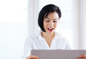 Business, excited and woman with laptop, celebration and happiness with good news, email and prize. Person, employee and professional with computer and success with giveaway or smile with achievement