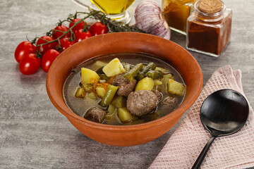 Soup with meatball and potato
