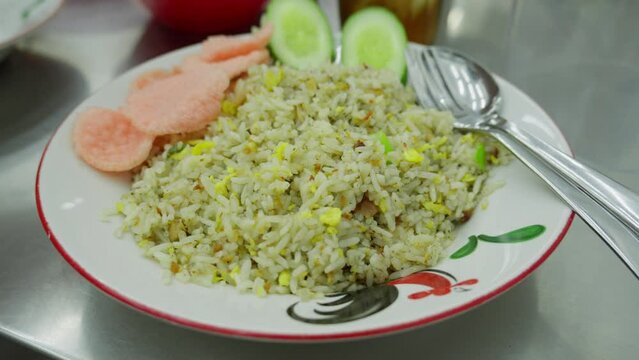 Indonesian skipjack tuna fried rice plate. Close up