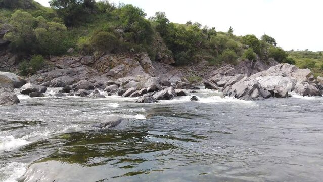 Tranquil Indigenous Stone River Landscape at South American Sierras, Water Flow