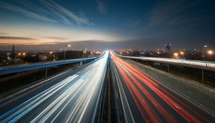 Fototapeta na wymiar Long and intensive car flow on highway roads during night