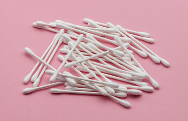 Cotton sticks swab isolated on pink background