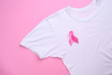 Pink October Breast Cancer Awareness Month. Pink Ribbon on White T-Shirt. National Cancer Survivors Month. 