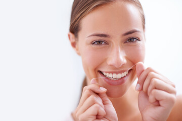 Woman, teeth and floss in portrait for dental hygiene with closeup, morning and cleaning mouth for...