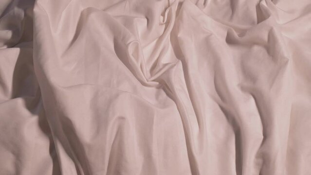 female hand with vibrator vacuum stimulator for single masturbation and satisfaction in sex. Sex toy in hand woman girl on a bed