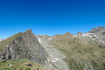 Panoramic view of unique mountain ridge Boese Nase in Ankogel Group, Carinthia, Austria. Idyllic hiking trail in remote Austrian Alps in summer. Looking at majestic rugged terrain of alpine landscape